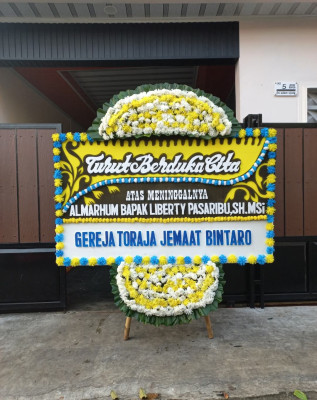 Papan Bunga Duka di Keteguhan